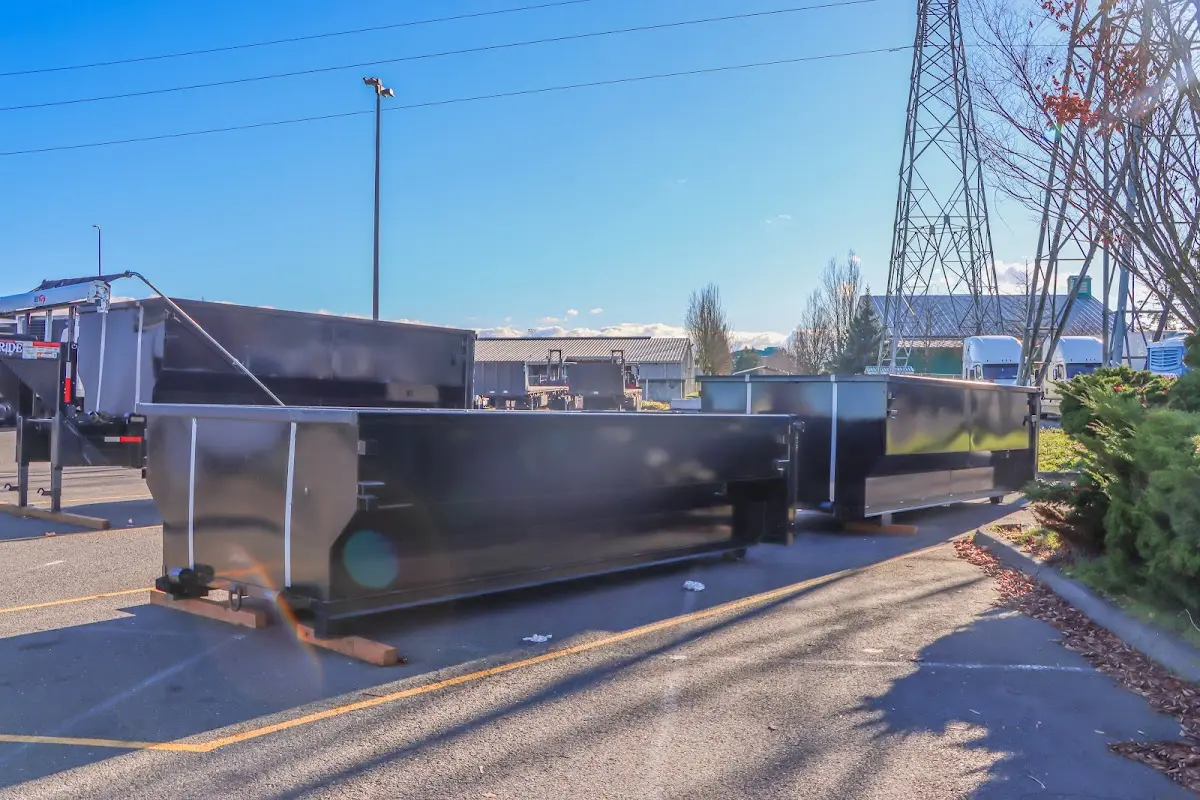 Roll-off dumpster ready for waste disposal at job site for 30 Yard Dumpster Rental in Amherst